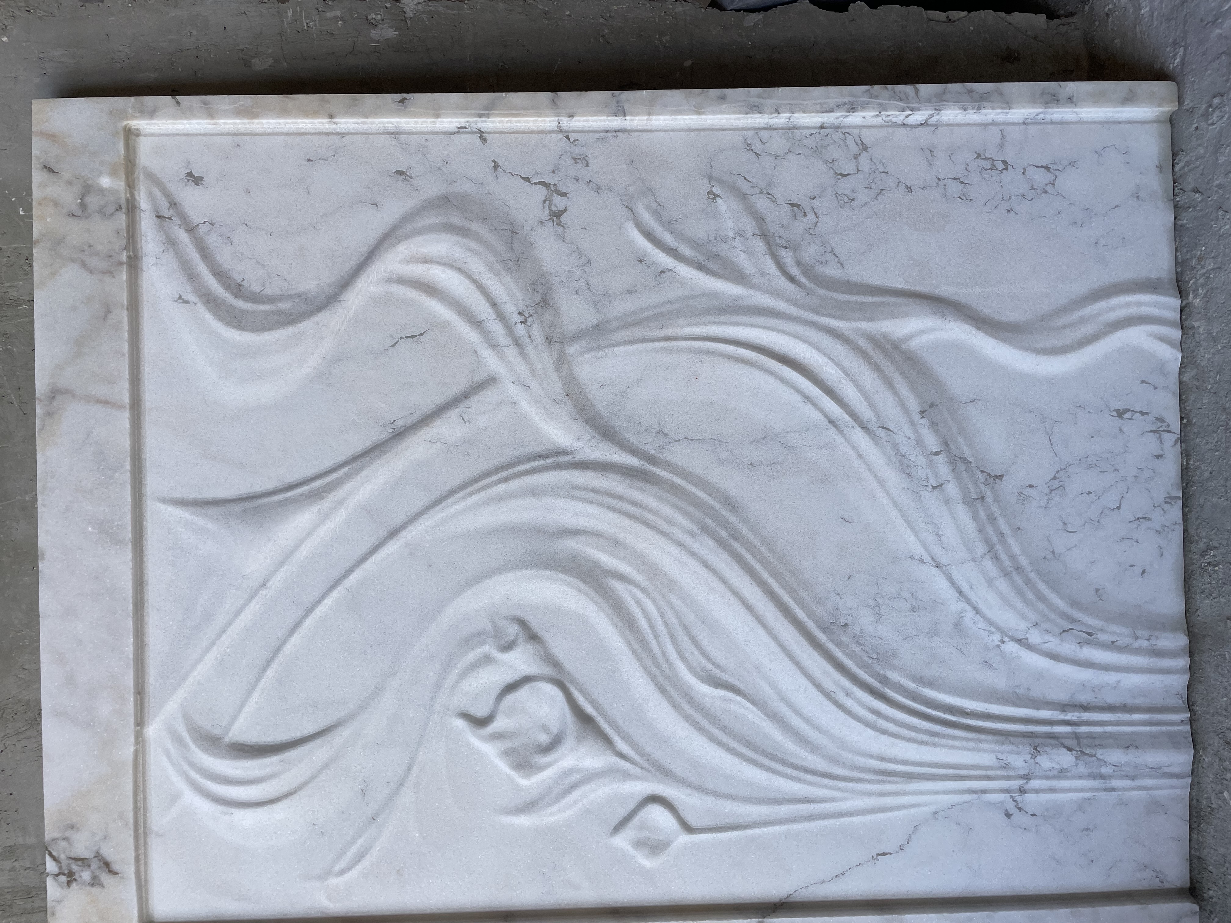 Flowing White Veined Marble Relief by MarbleVeins.