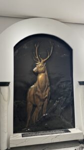 Artistic painted 3D deer bas-relief in basalt stone by MarbleVeins in Jordan.