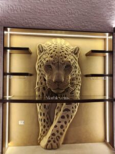 Hand-painted 3D leopard bas-relief carved in basalt stone by MarbleVeins in Jordan.